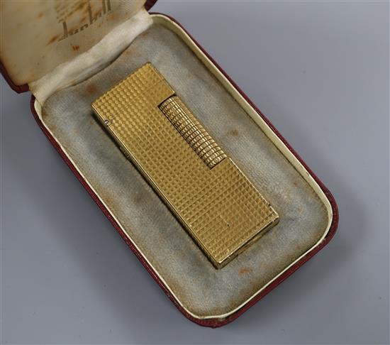 A Dunhill gold plated rollagas lighter